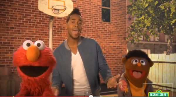Romeo Santos and Elmo sing on Sesame Street